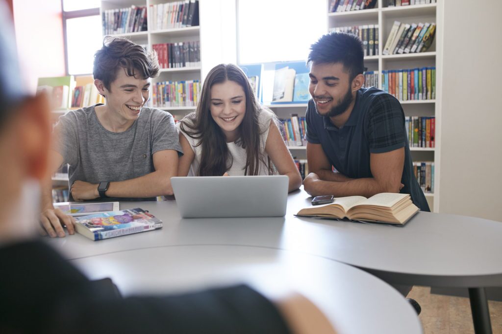 students at laptop